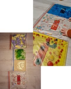 verschillende voelzakjes waar een baby mee speelt en ontdekt